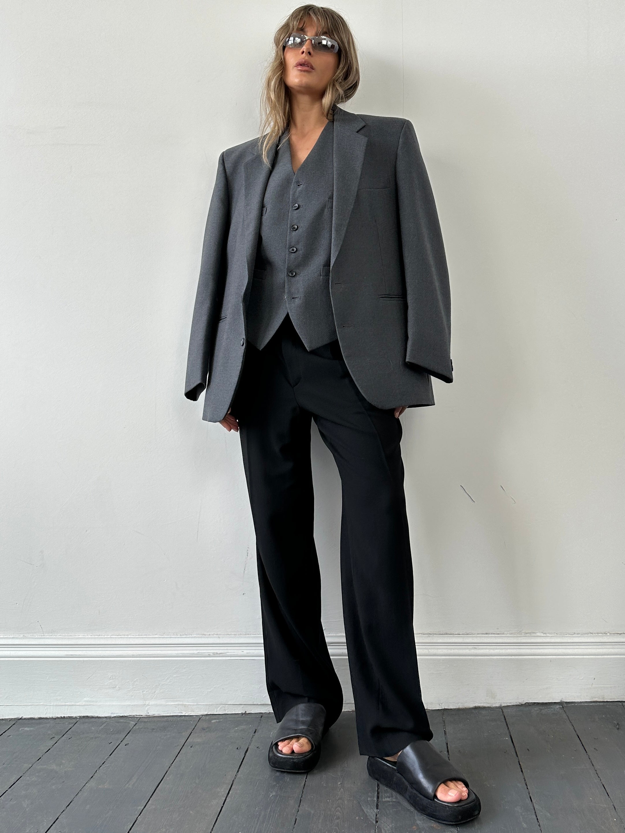 Vintage British two-piece blazer and waistcoat set, size M/42, classic tailored style, featuring traditional lapels and button details.