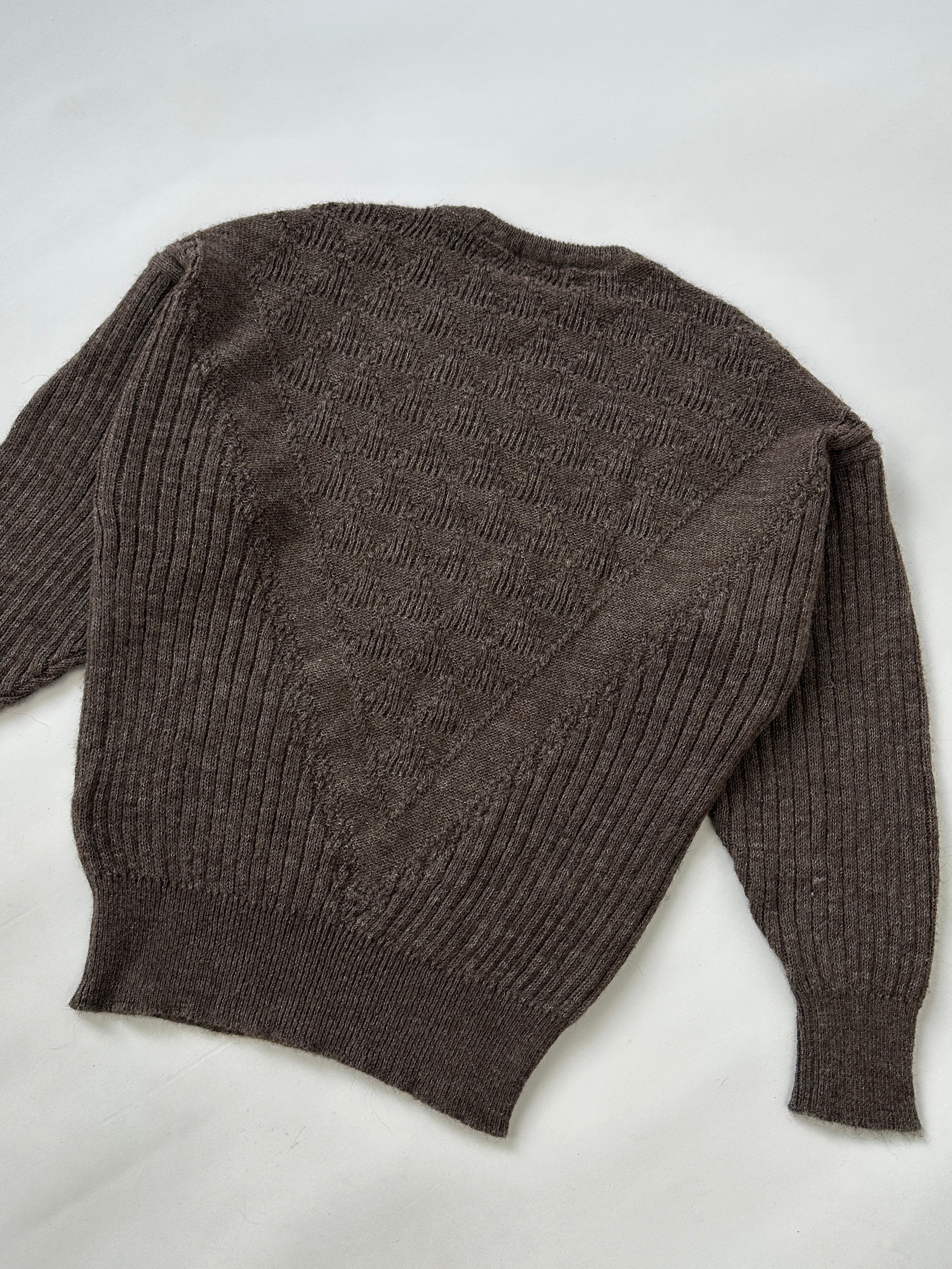 Versace 80s alpaca wool jumper in M/L, featuring a cozy knit design and classic style, displayed on a neutral background.