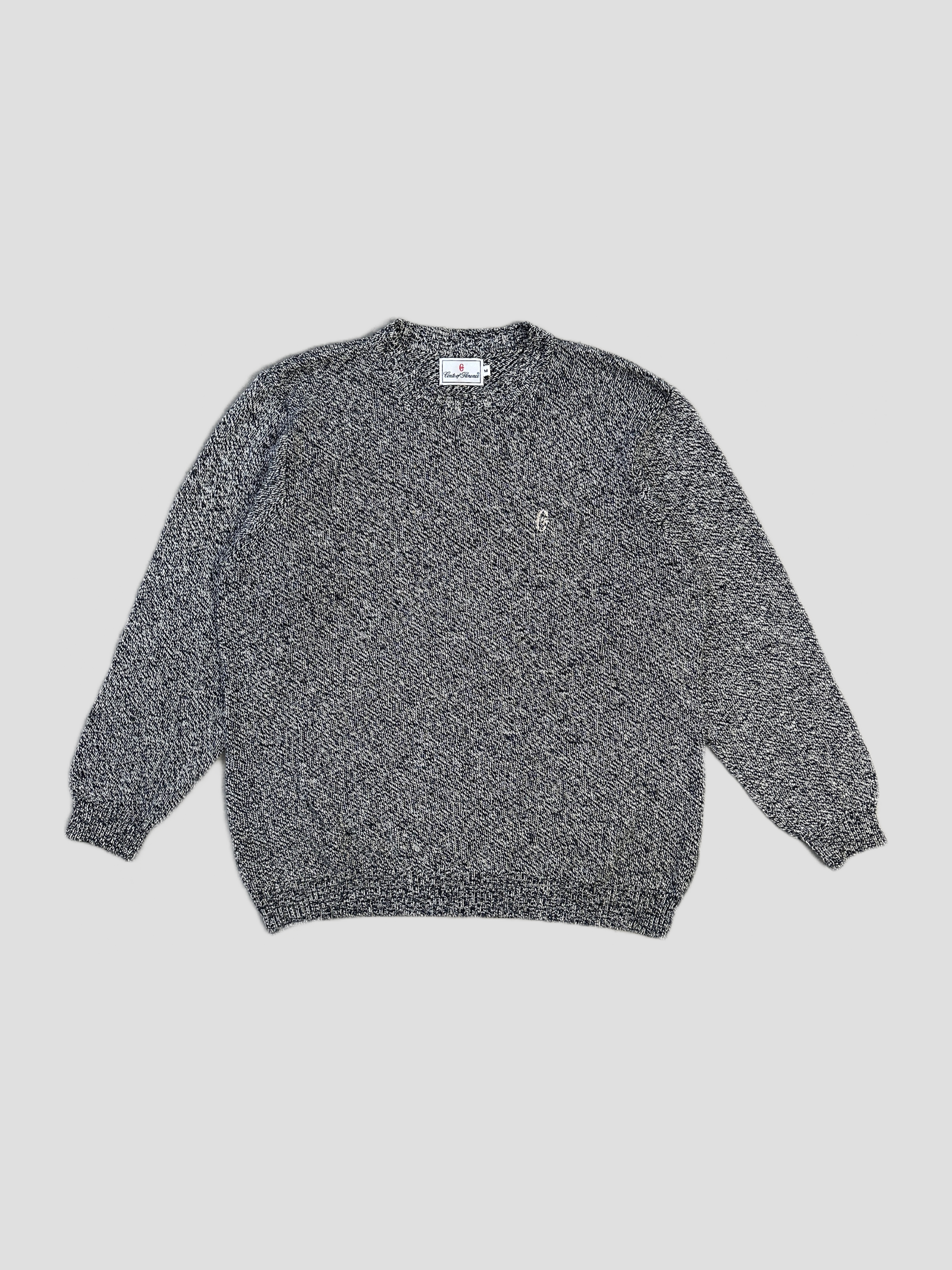 Vintage knit jumper in melange yarn with embroidered logo, size L/XL, showcasing a cozy, vintage-inspired design.