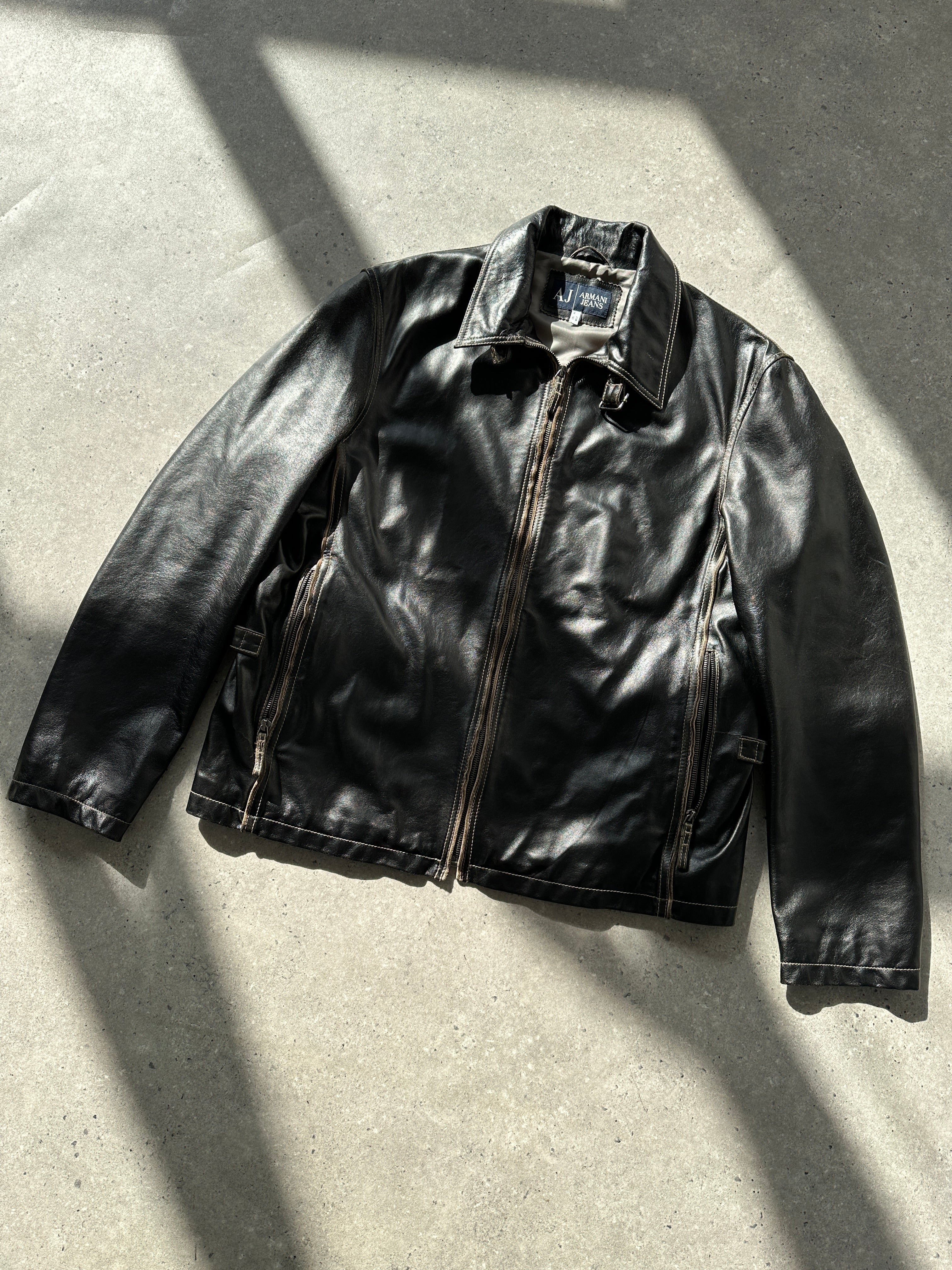 Armani Jeans contrast stitch leather jacket in size L, featuring stylish stitching details and a sleek leather finish.