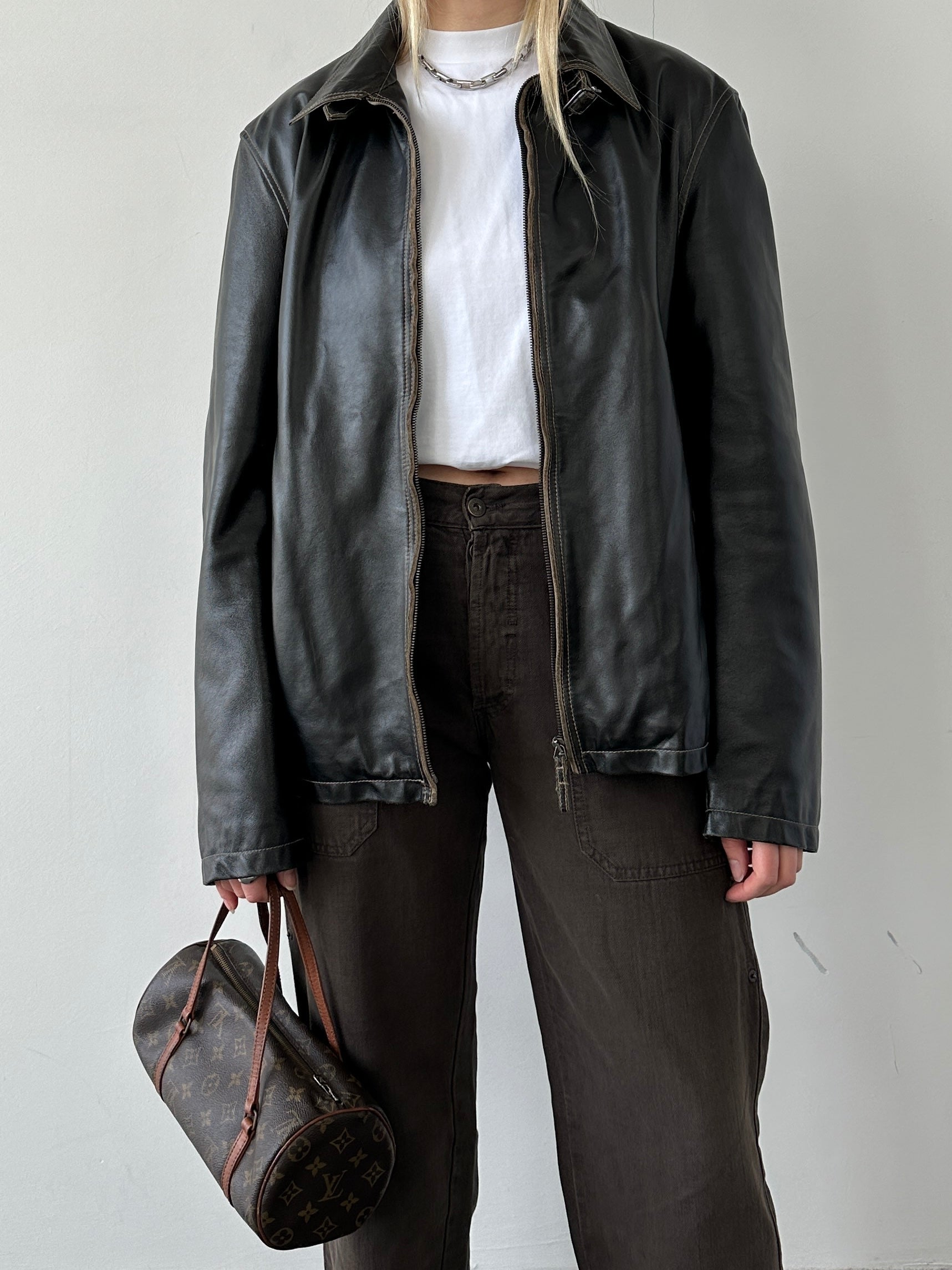 Armani Jeans contrast stitch leather jacket in size L, featuring stylish stitching details and a sleek, fitted design.