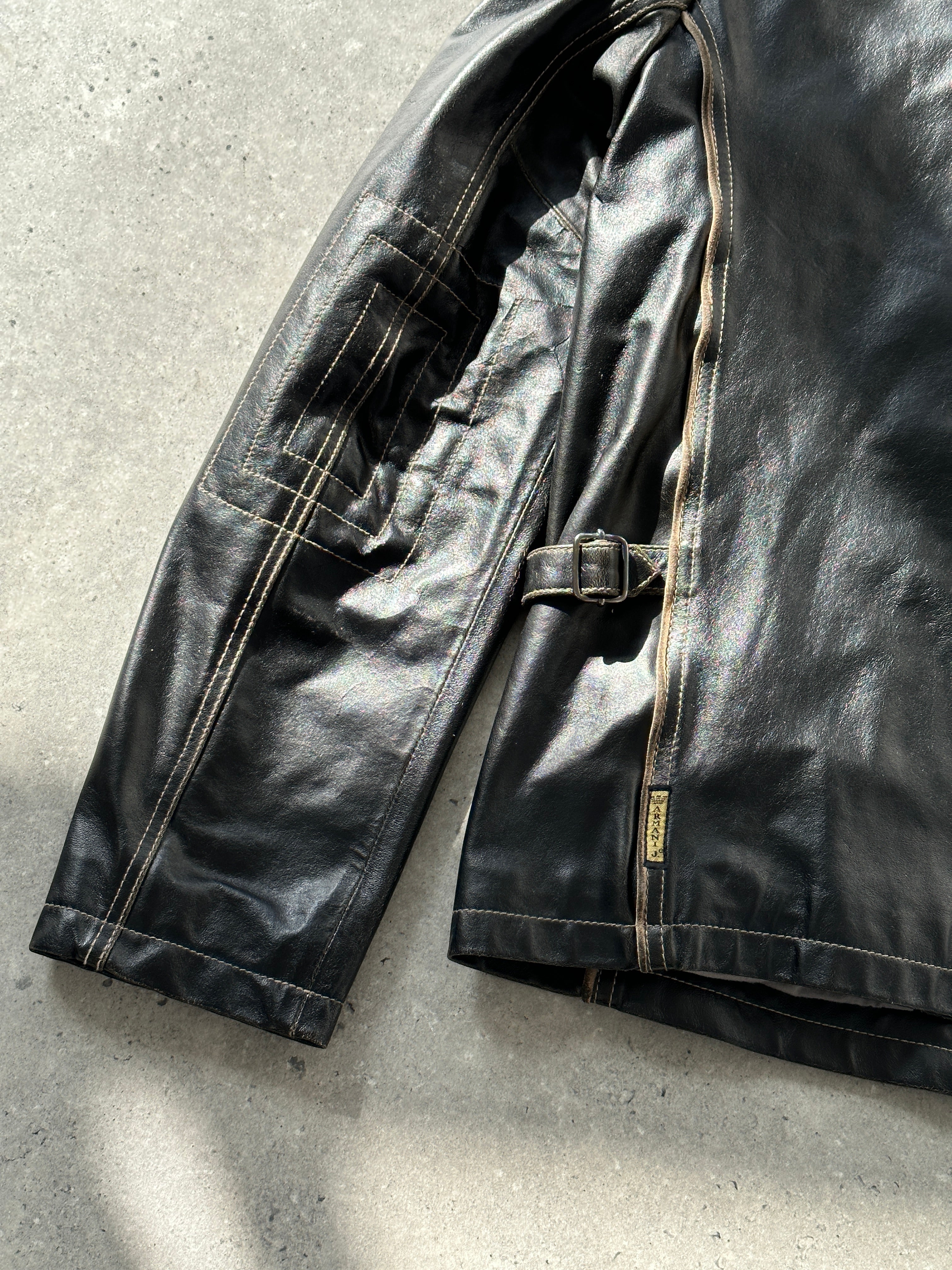 Armani Jeans black leather jacket with contrast stitching, front view showing collar, zipper, and stylish details, size L.