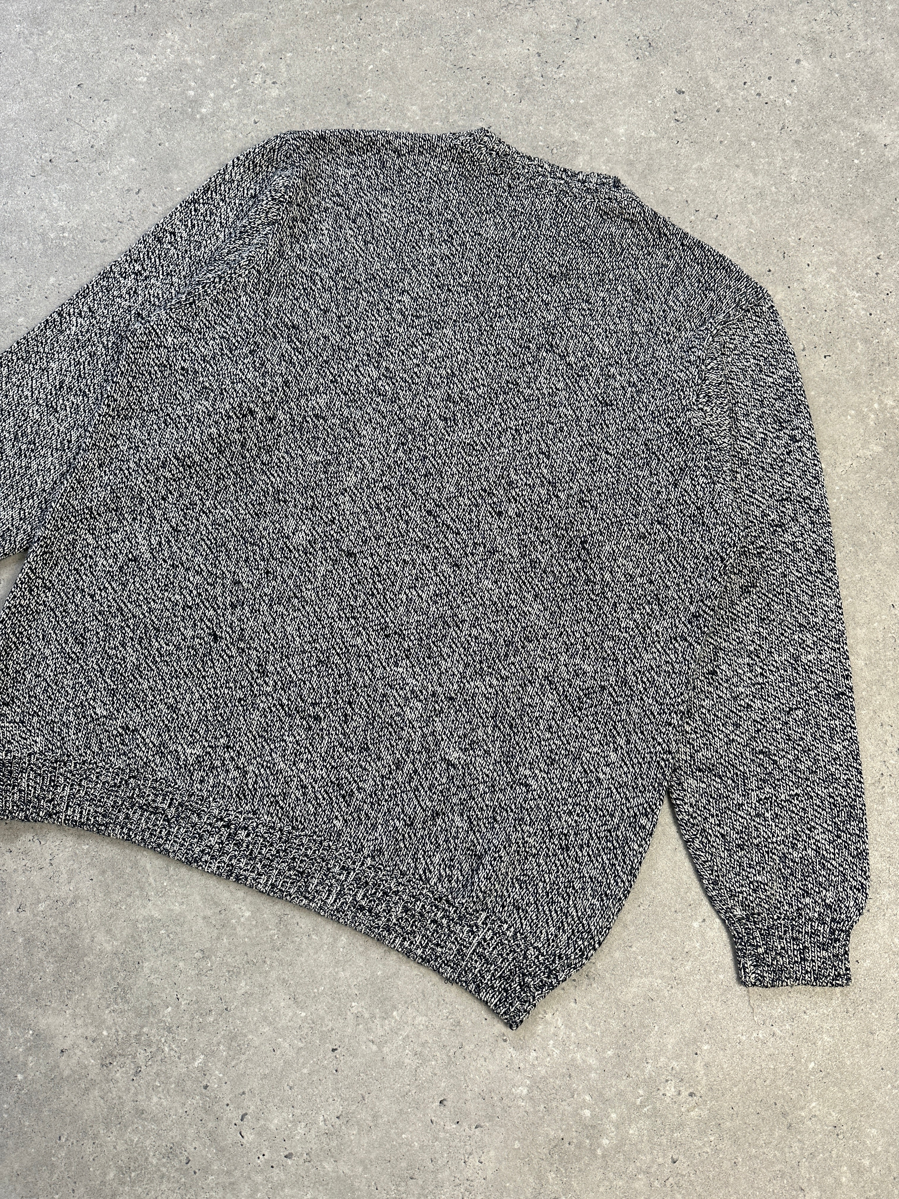 Vintage knitted melange embroidery logo jumper in size L/XL, featuring a cozy knit with embroidered logo detail.