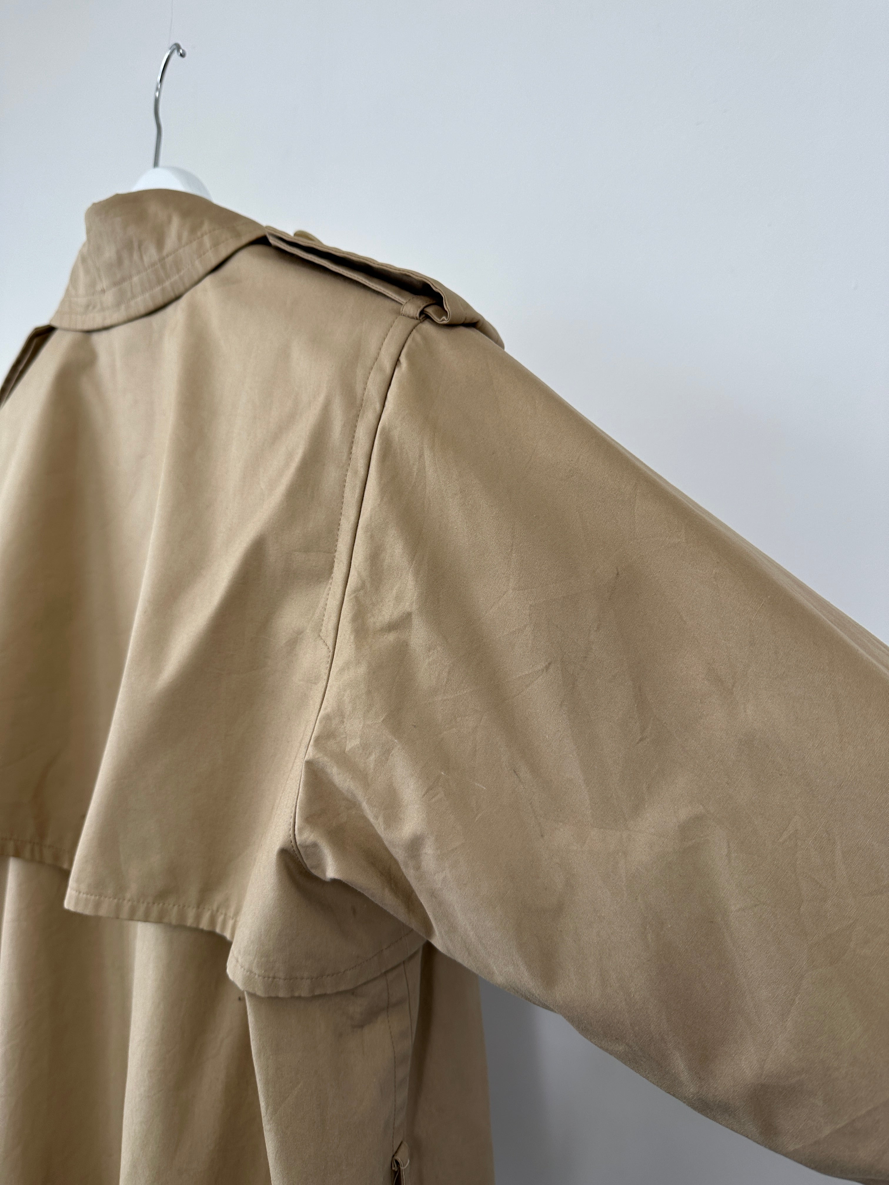 Yves Saint Laurent Paris double-breasted trench coat in size M, featuring classic design and beige fabric, stylish outerwear.