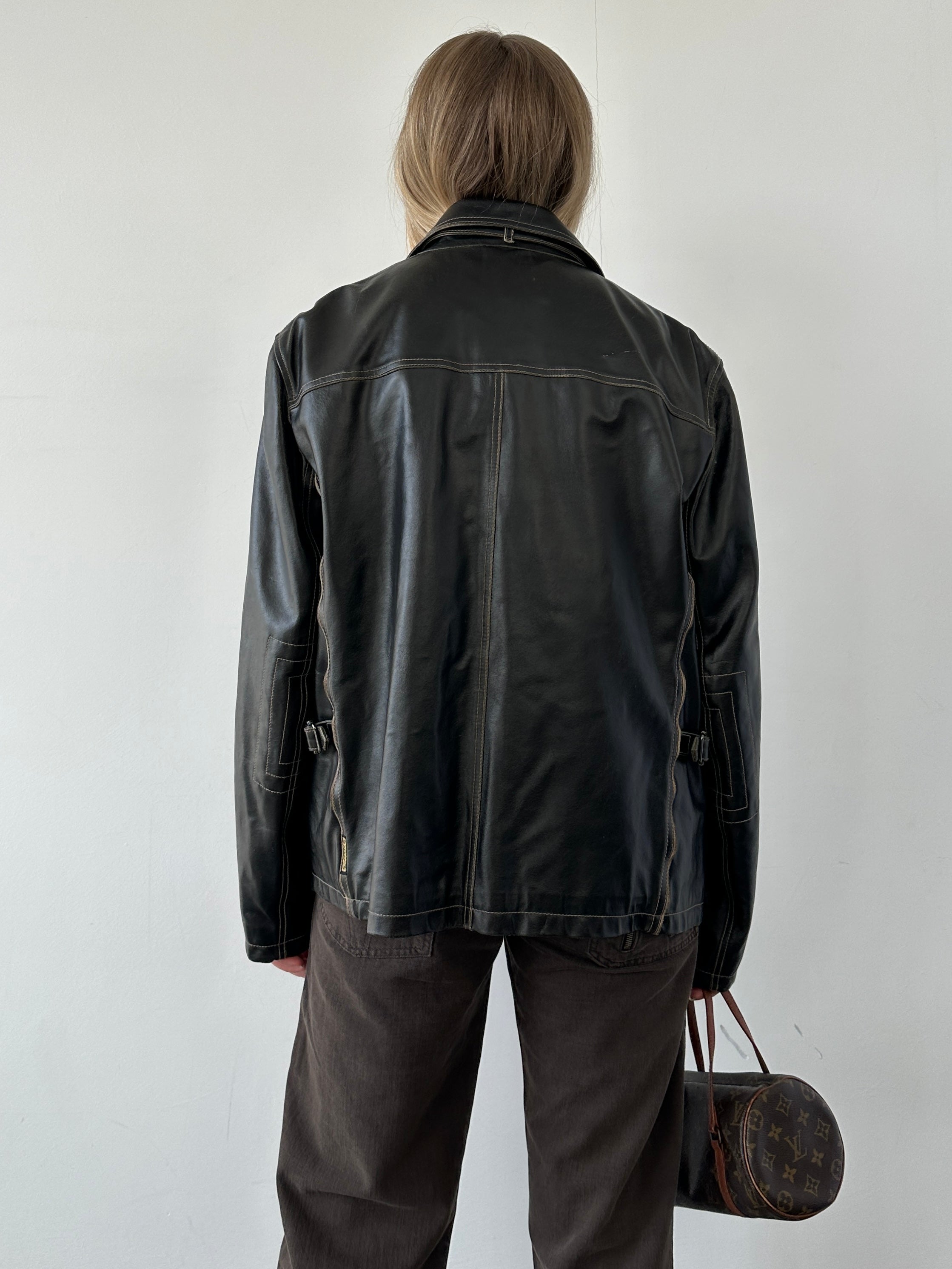 Armani Jeans black leather jacket with contrast stitching, featuring a classic fit and stylish design, front view.