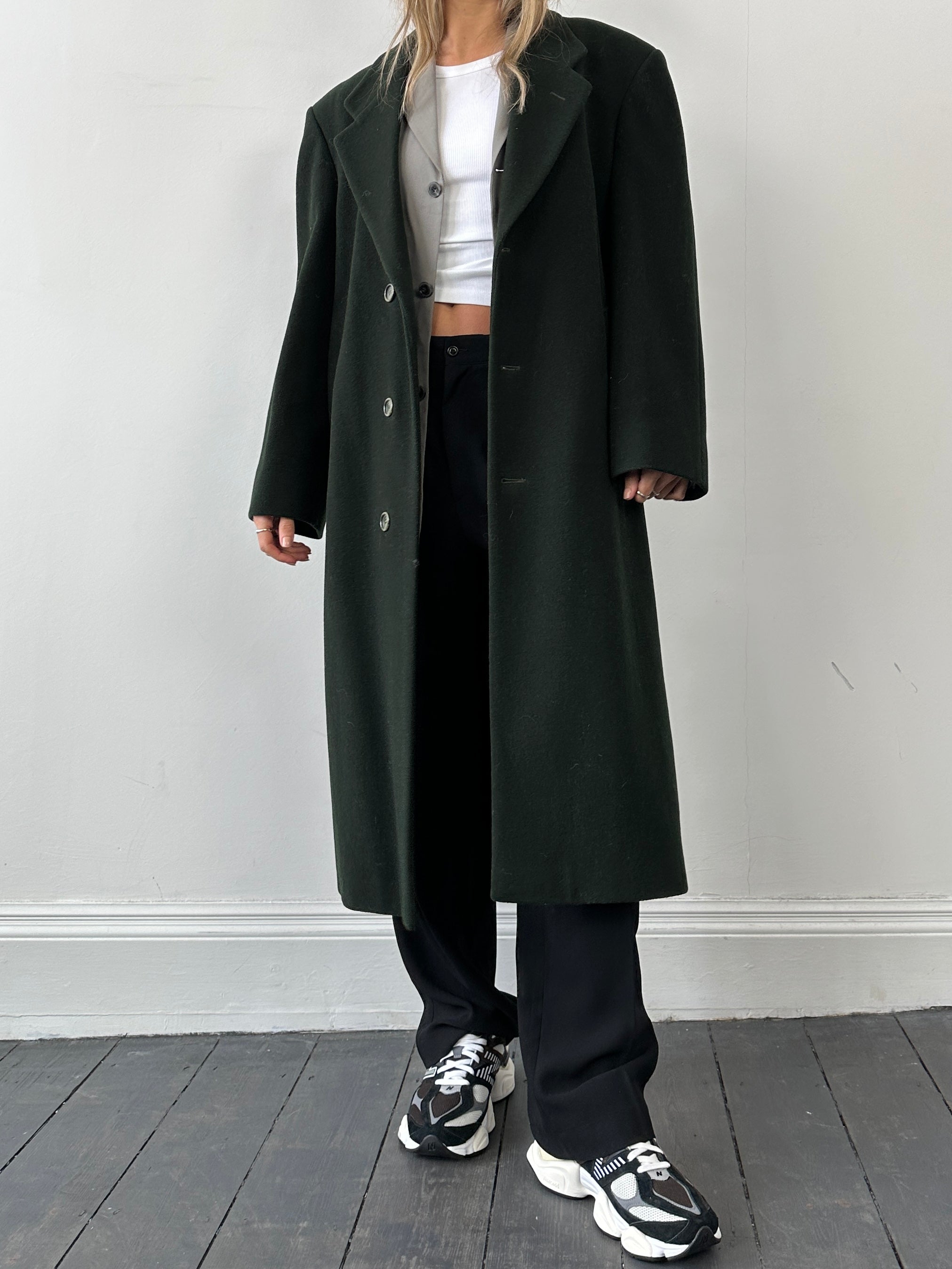 Pierre Cardin single-breasted wool cashmere coat in size L/XL, shown in classic black with lapel collar and button closures.