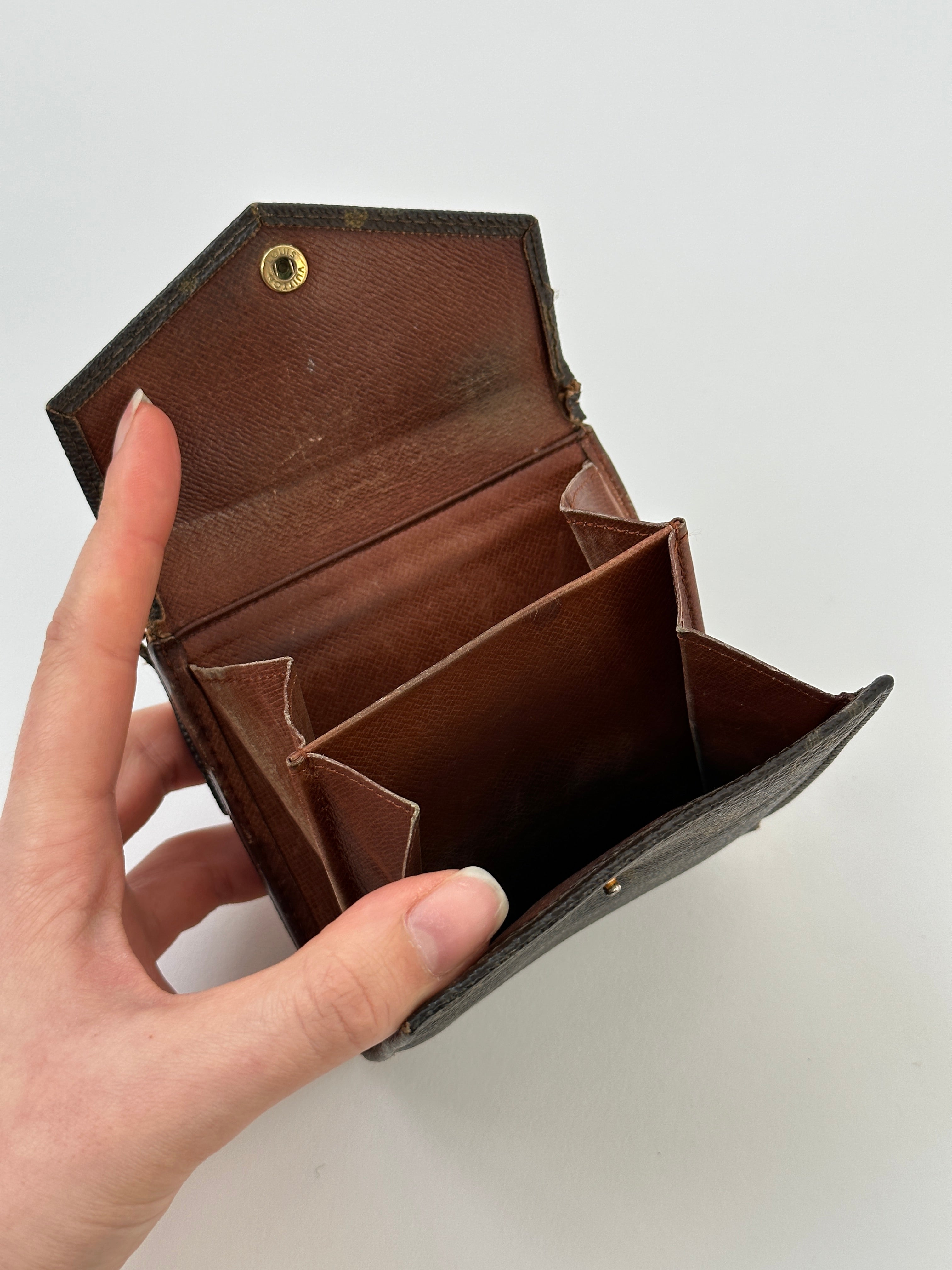 Louis Vuitton 1989 Monogram Wallet with classic LV monogram pattern, leather trim, and multiple card slots.