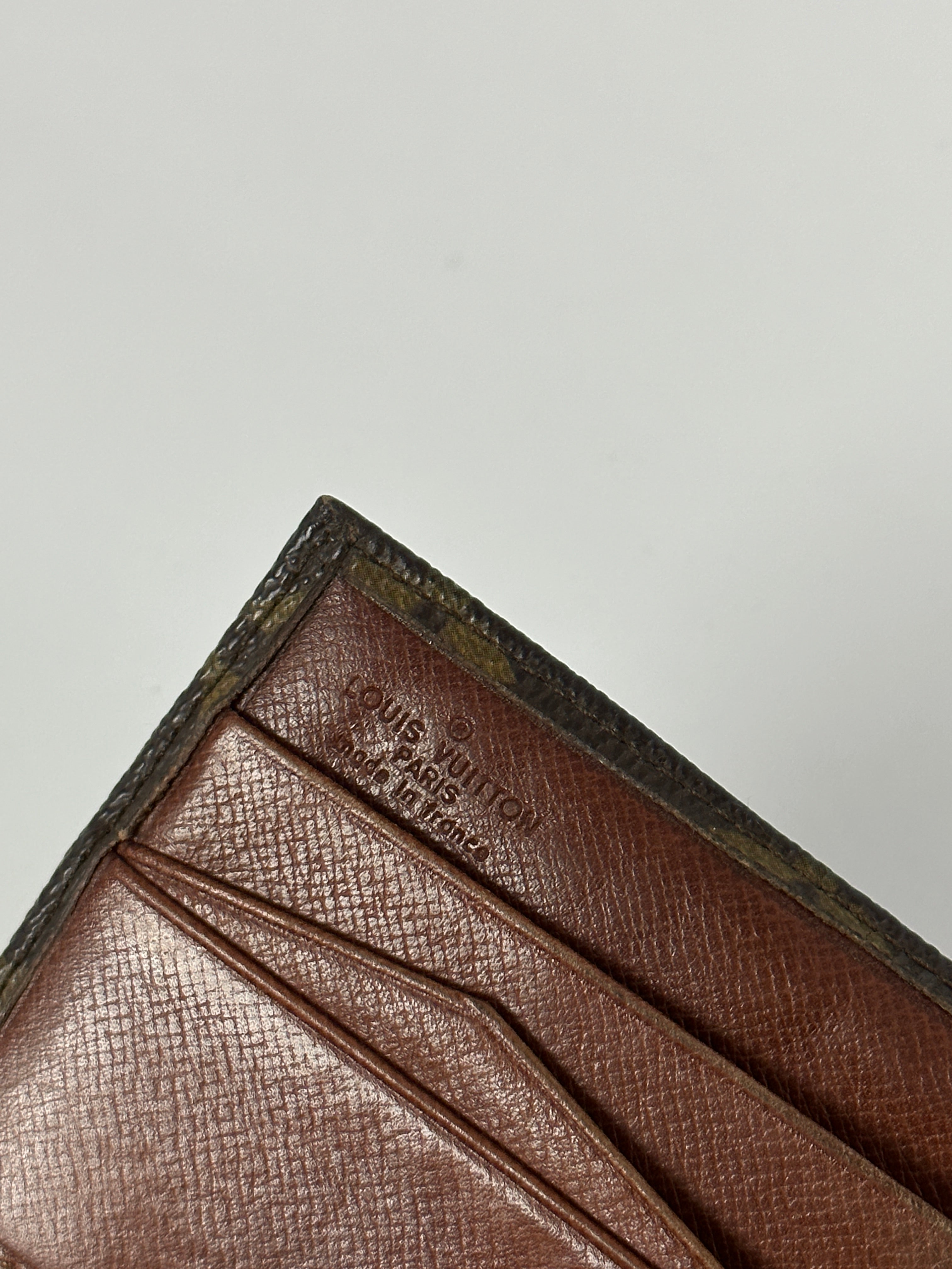 Louis Vuitton 1984 Monogram Wallet featuring classic brown monogram canvas and leather trim.
