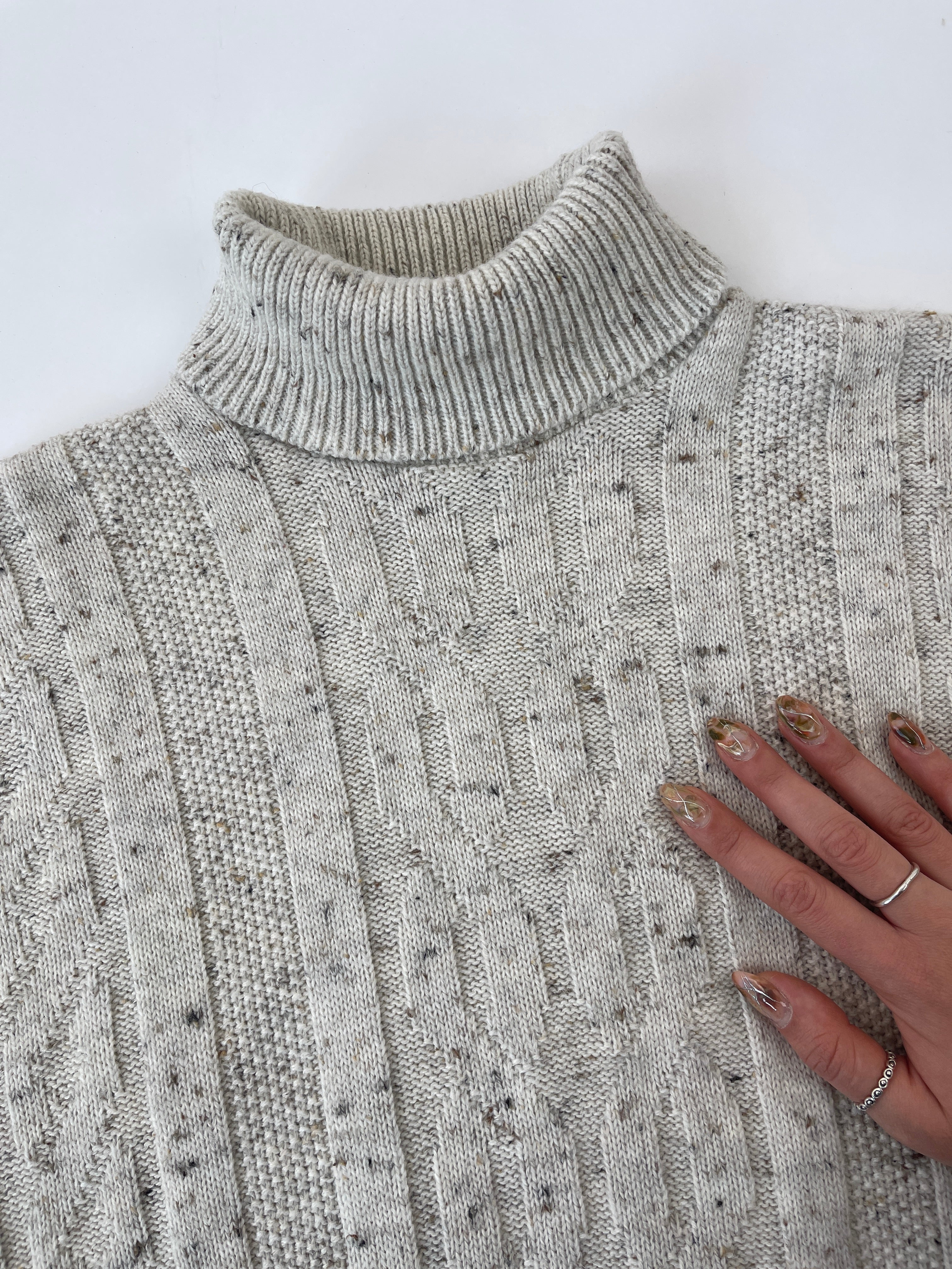Beige vintage speckle wool roll neck jumper for women, cozy and stylish, made by Vintage.