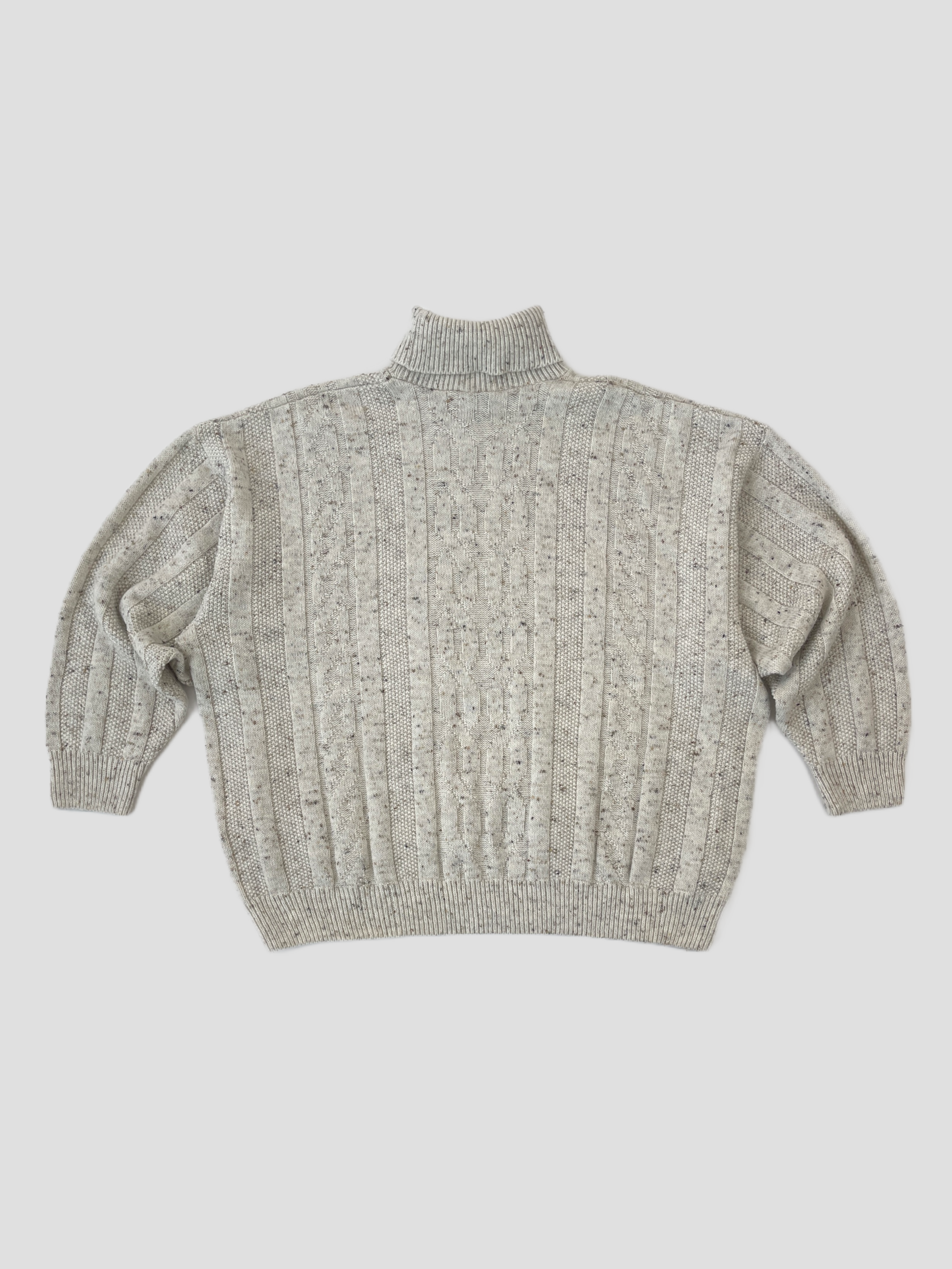 Beige vintage speckle wool roll neck jumper, cozy knit sweater with ribbed collar and textured pattern, on a plain background.