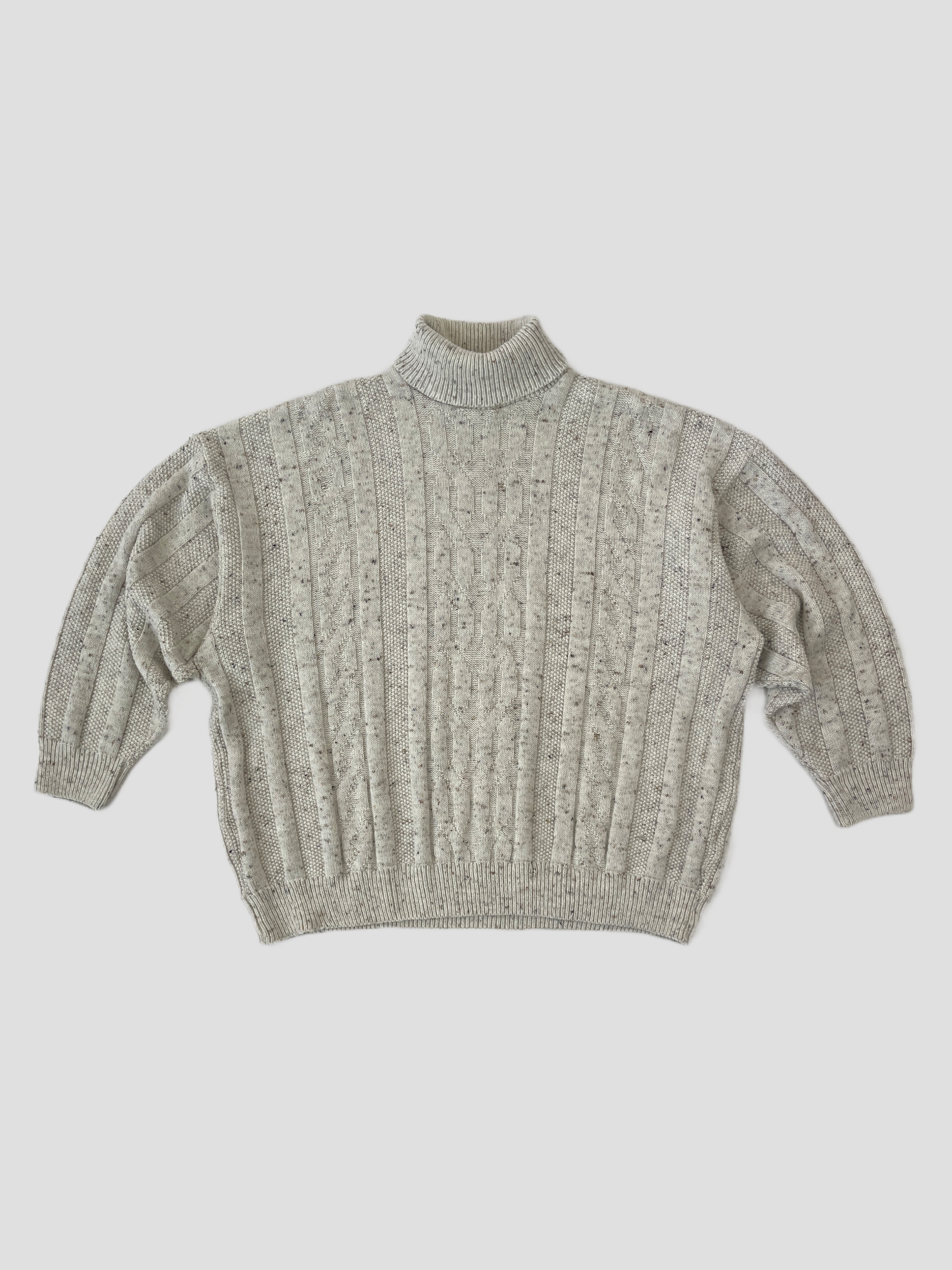 Beige Vintage speckle wool roll neck jumper, cozy and stylish, featuring a classic vintage design and textured knit pattern.