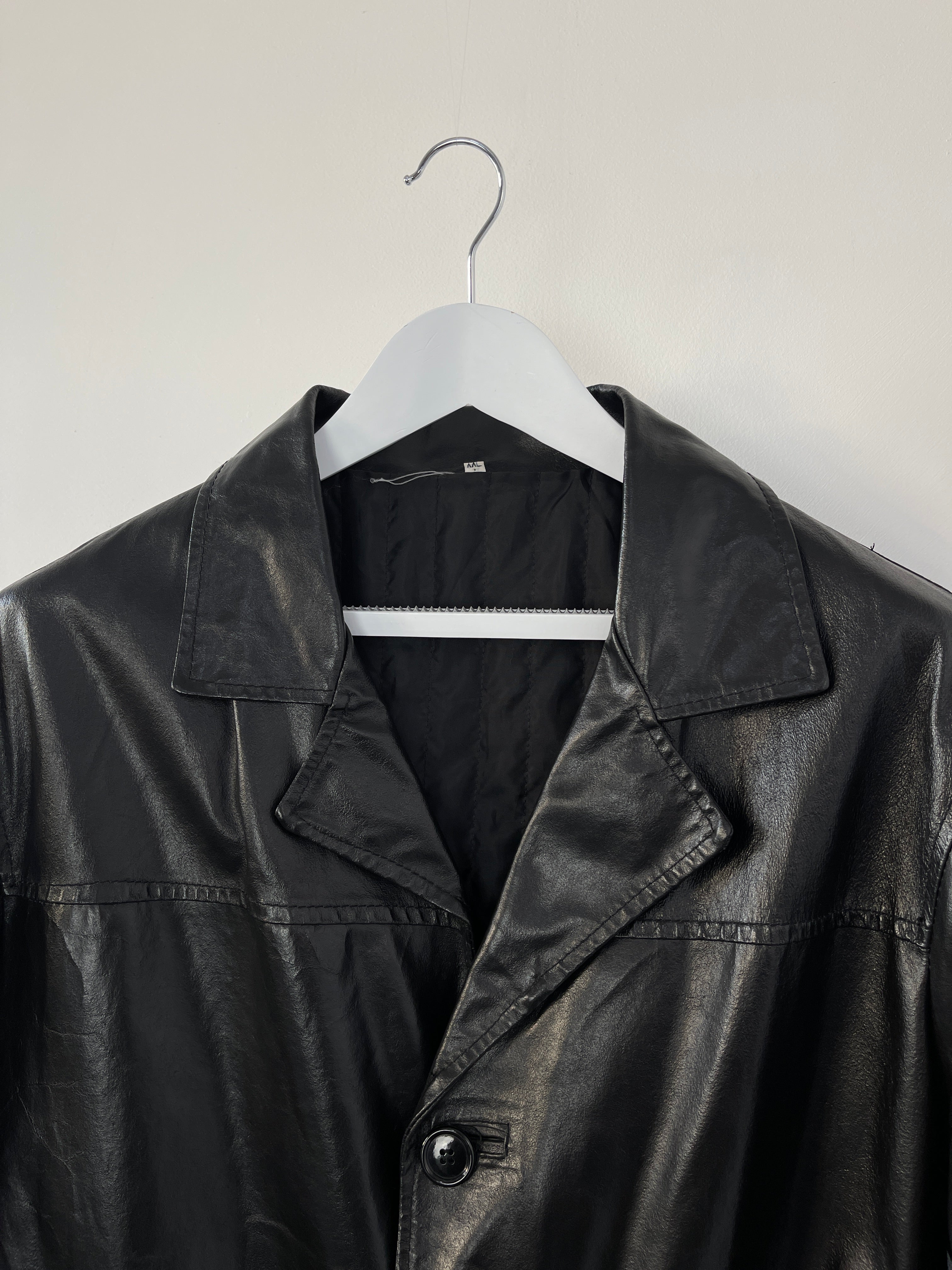 Black Italian vintage leather trench coat jacket in size XL, featuring classic design and premium leather craftsmanship.