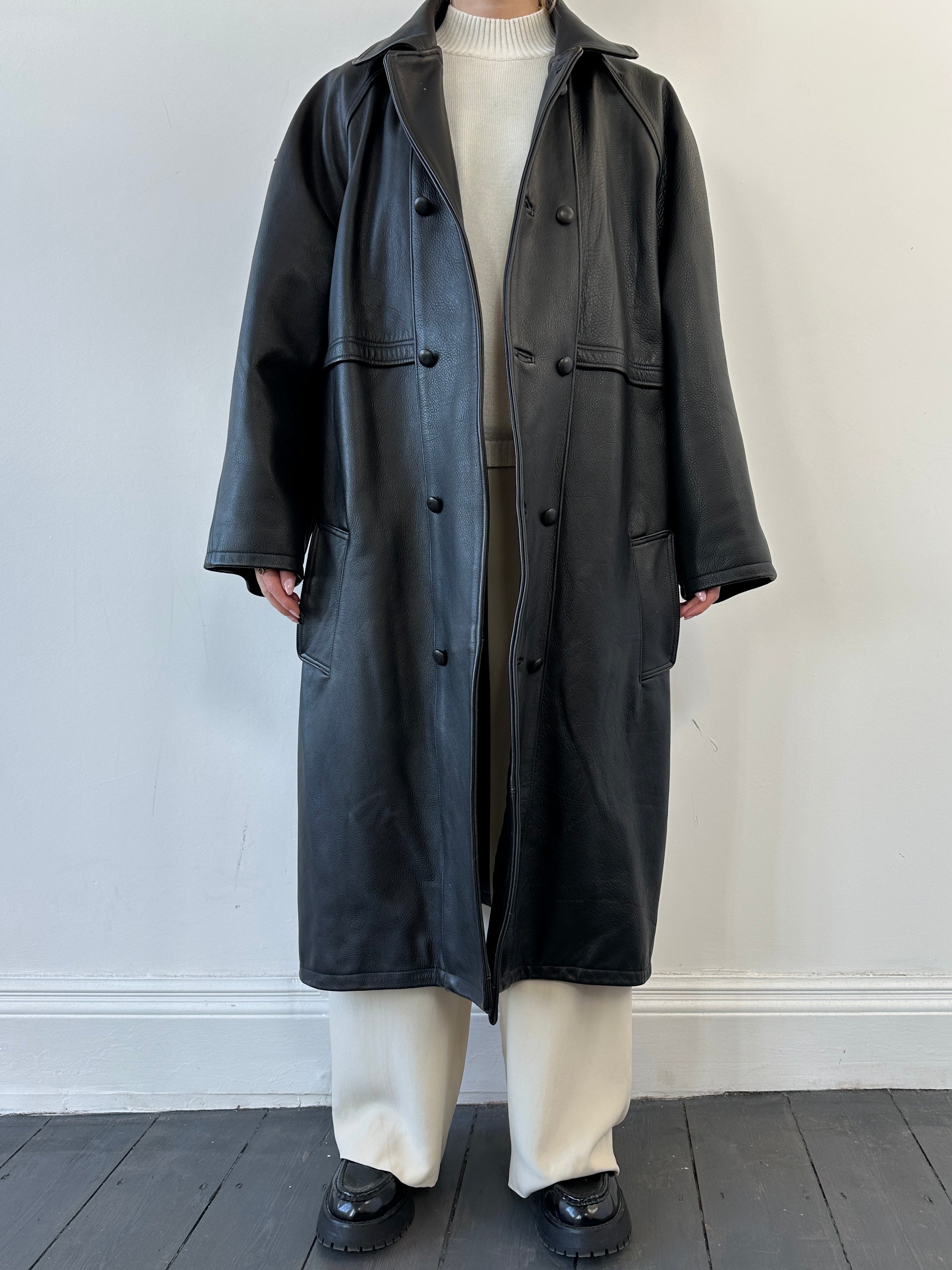 Black vintage leather trench coat jacket in size XL, featuring classic design and aged leather finish.