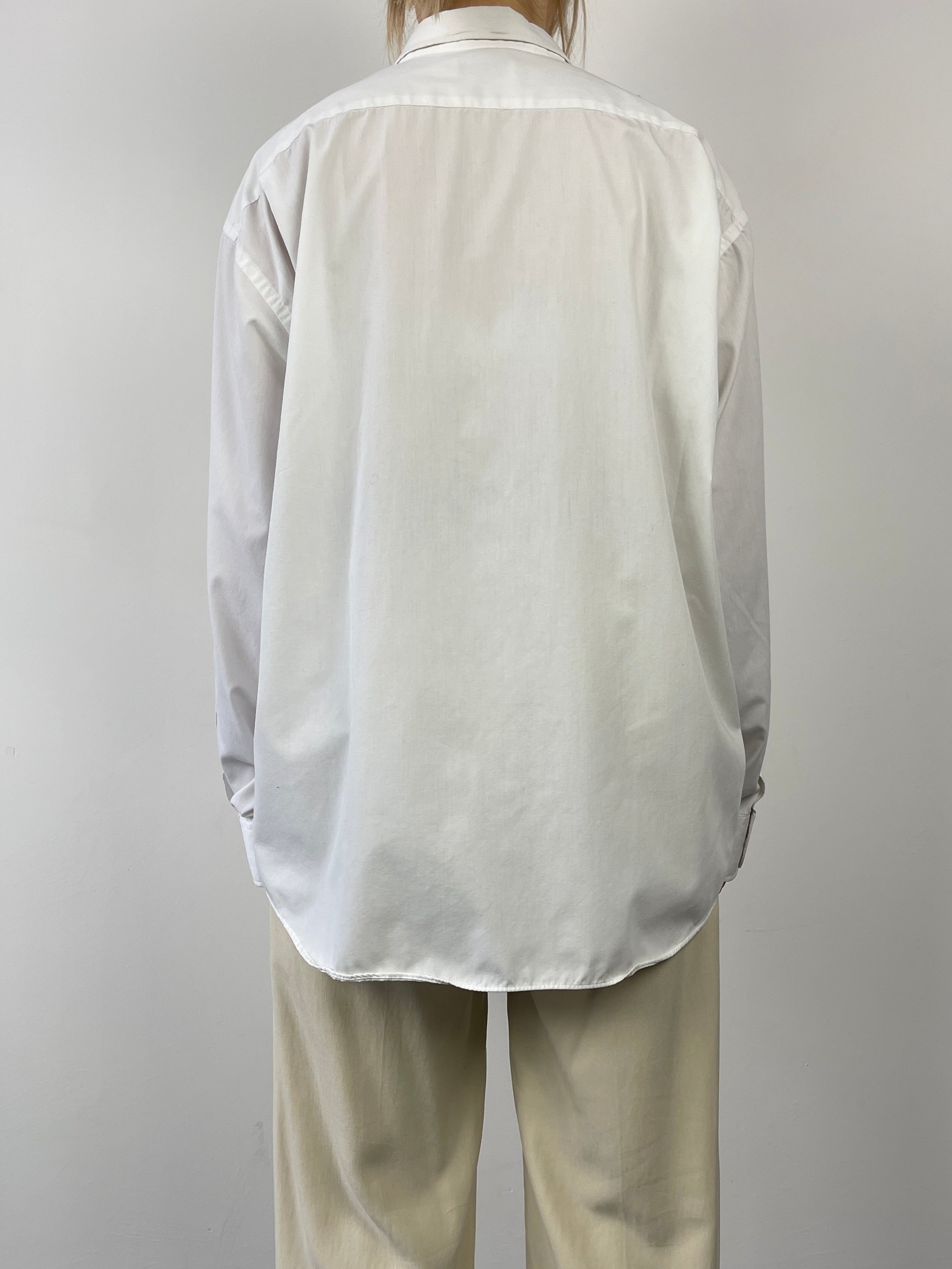 White Yves Saint Laurent cotton shirt, classic button-up style with a sleek fit and elegant design.